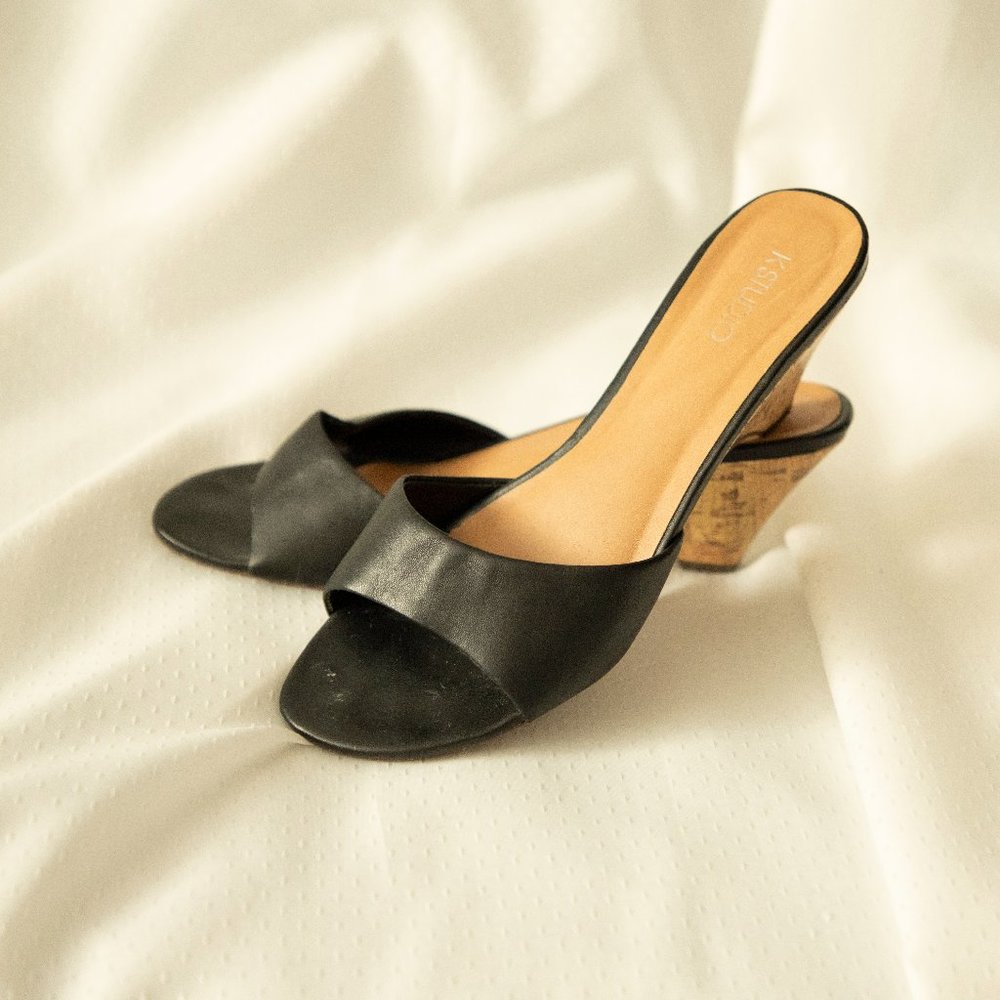 Black leather wedge sandals